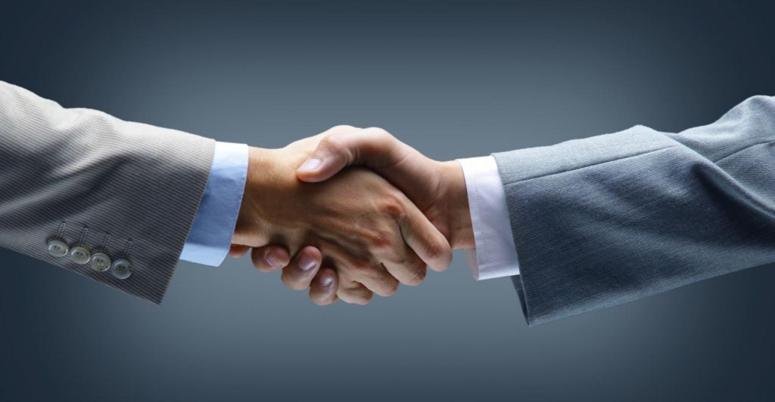 Handshake-Hand-holding-on-black-background